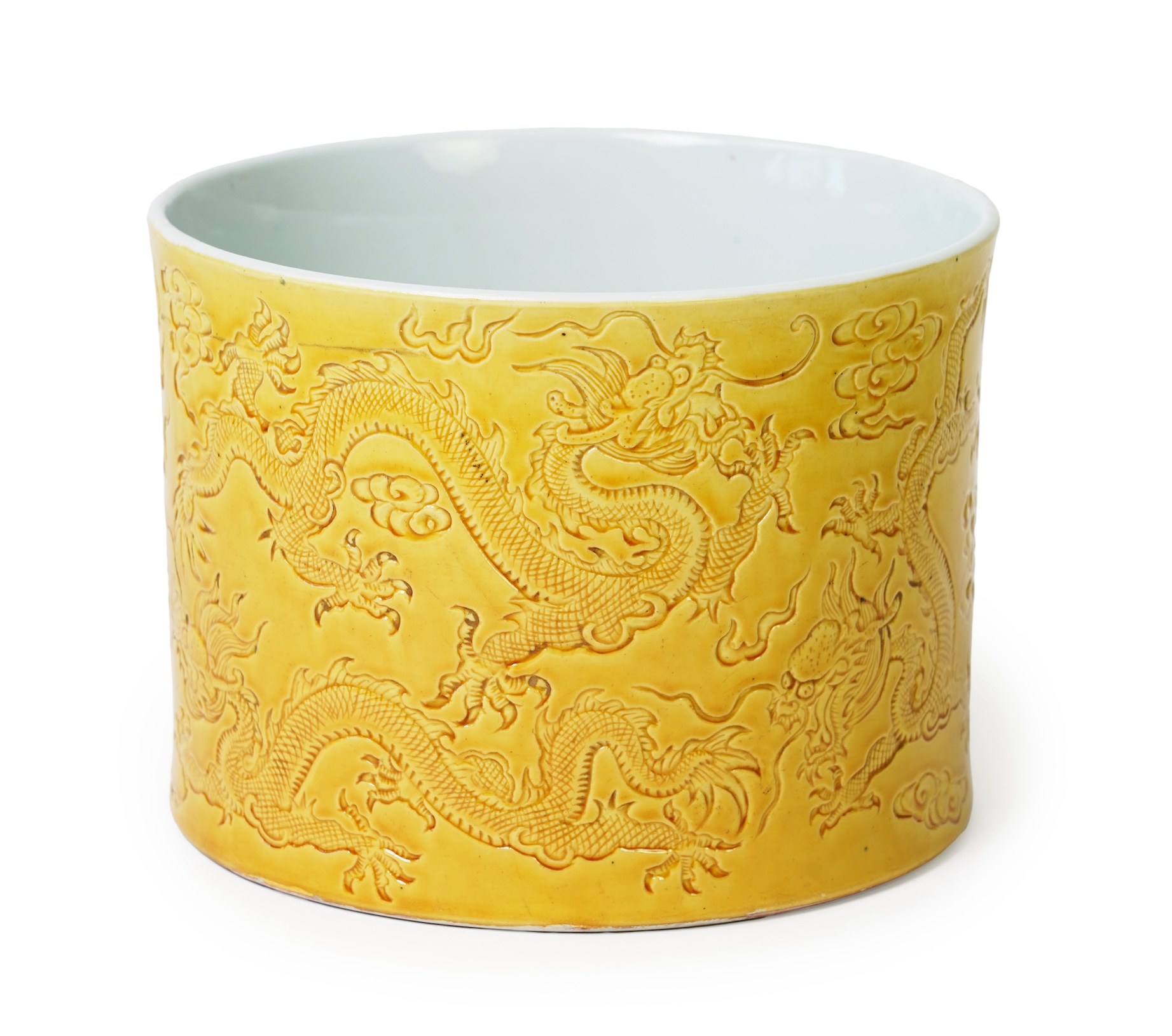 A Chinese yellow glazed 'dragon' brush pot, possibly Republic period